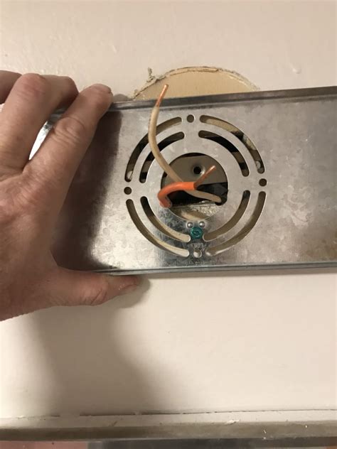 how to install electrical box for vanity light|fixing off center vanity light.